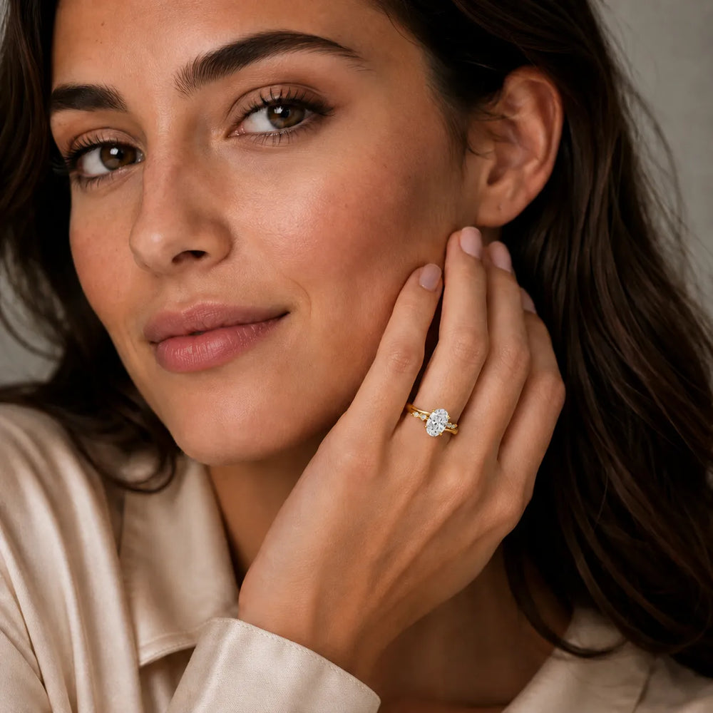 Flora Twist Side Stone Oval Diamond Engagement Ring