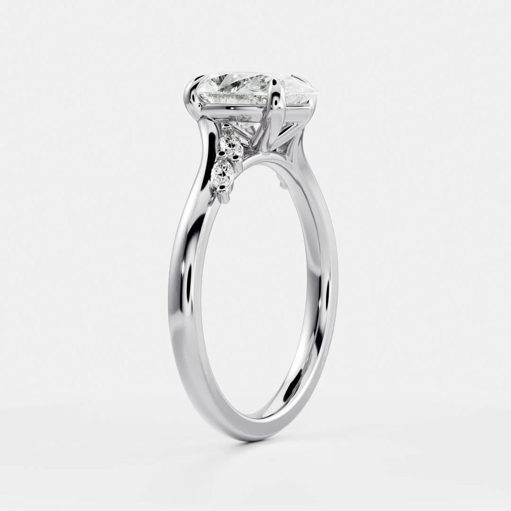 Flora Twist Side Stone Oval Diamond Engagement Ring