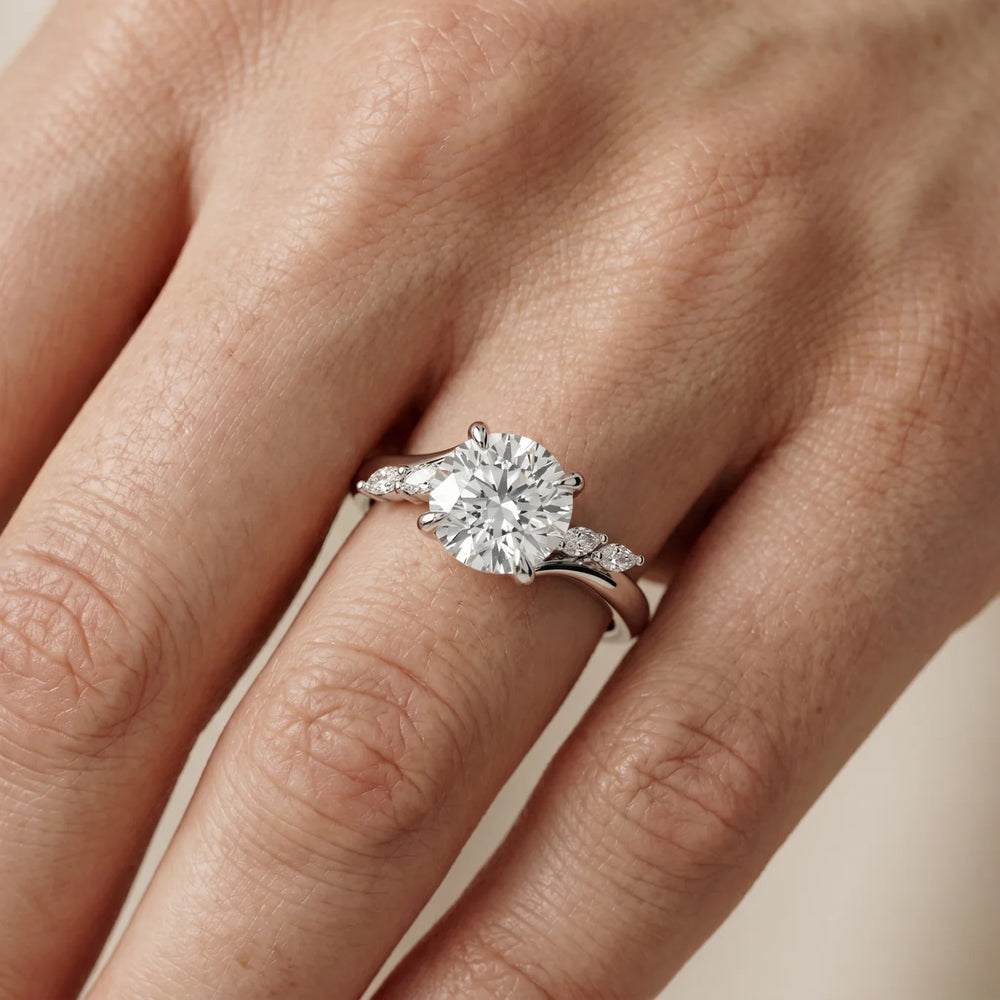 Flora Twist Side Stone Oval Diamond Engagement Ring