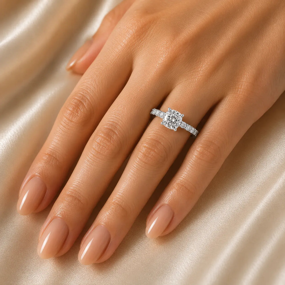 Elegant Solitaire Ring with Graduated Accent Stones