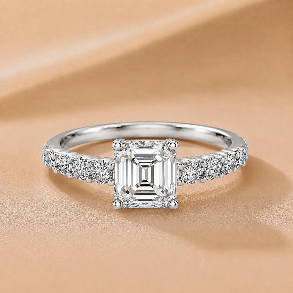 Elegant Solitaire Ring with Graduated Accent Stones
