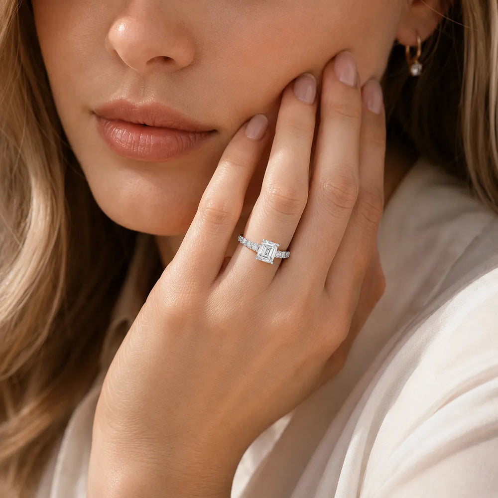 Elegant Solitaire Ring with Graduated Accent Stones
