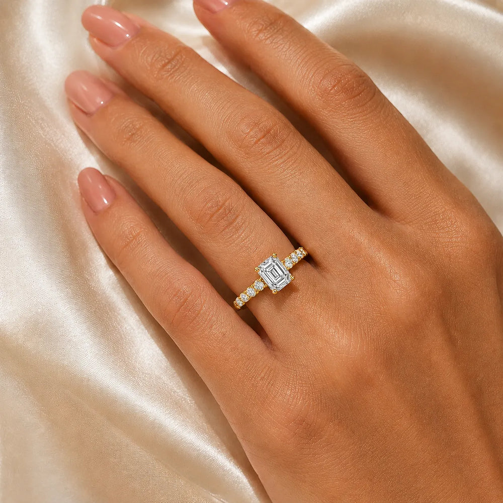 Elegant Solitaire Ring with Graduated Accent Stones