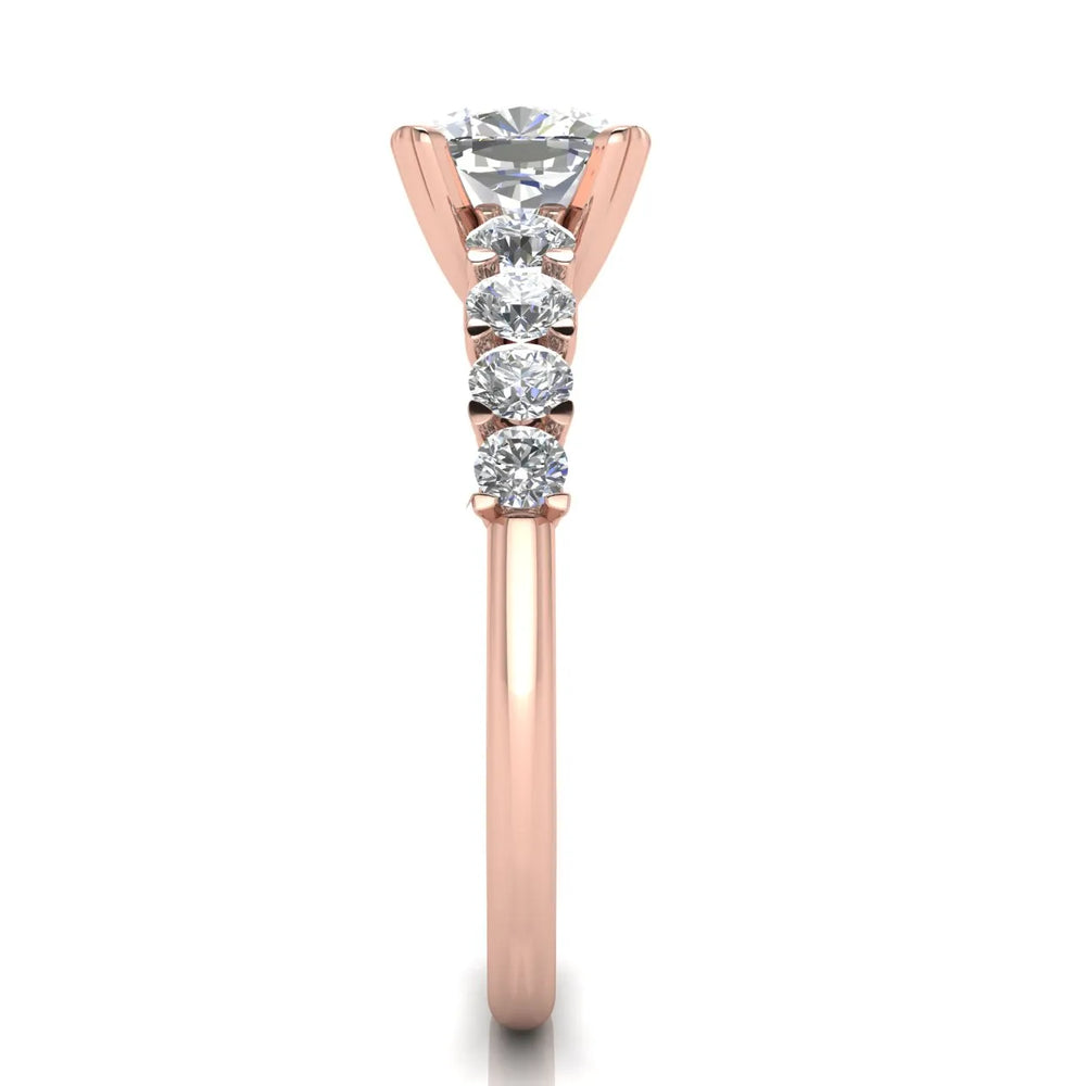 Elegant Solitaire Ring with Graduated Accent Stones