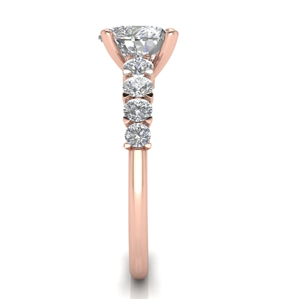 Elegant Solitaire Ring with Graduated Accent Stones