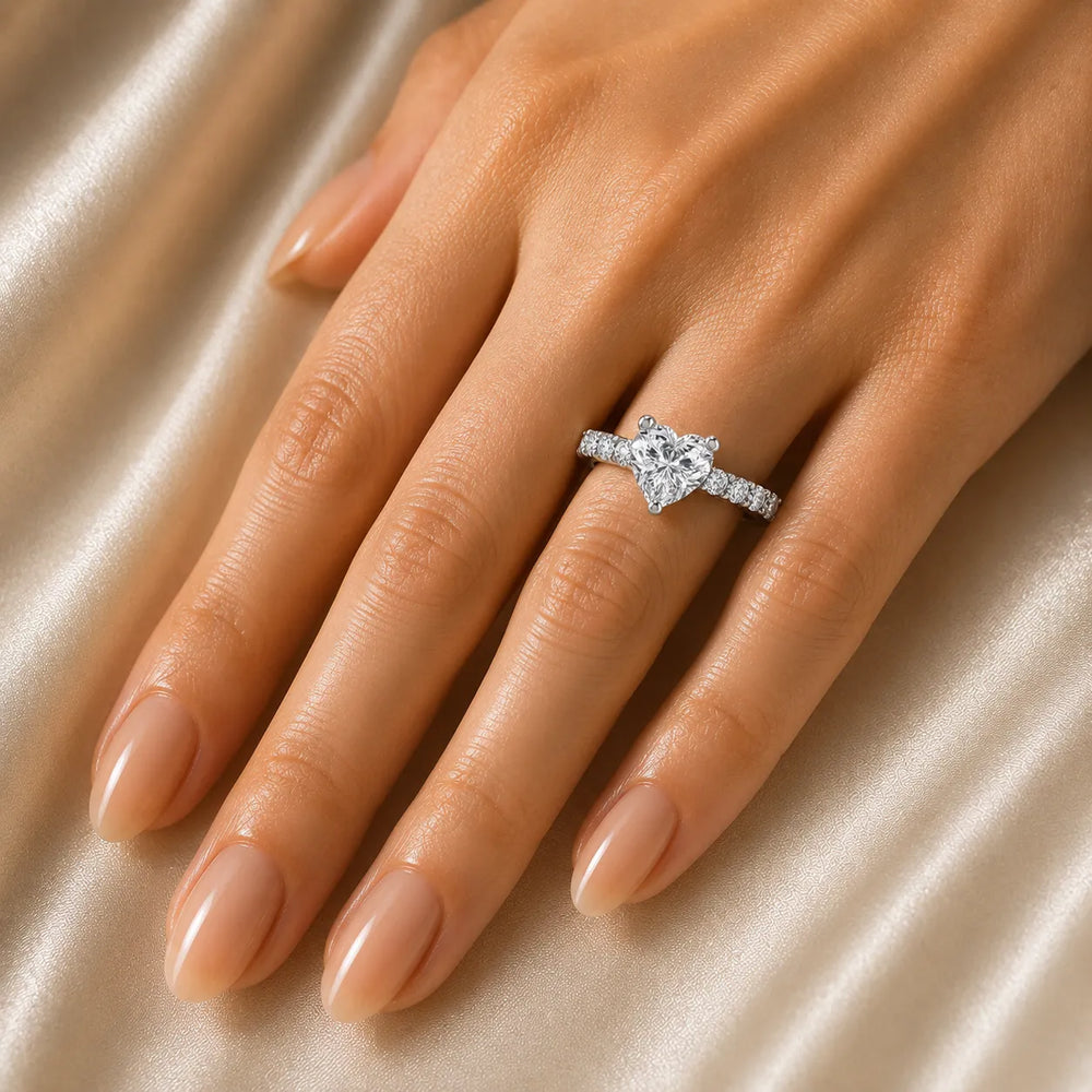 Elegant Solitaire Ring with Graduated Accent Stones