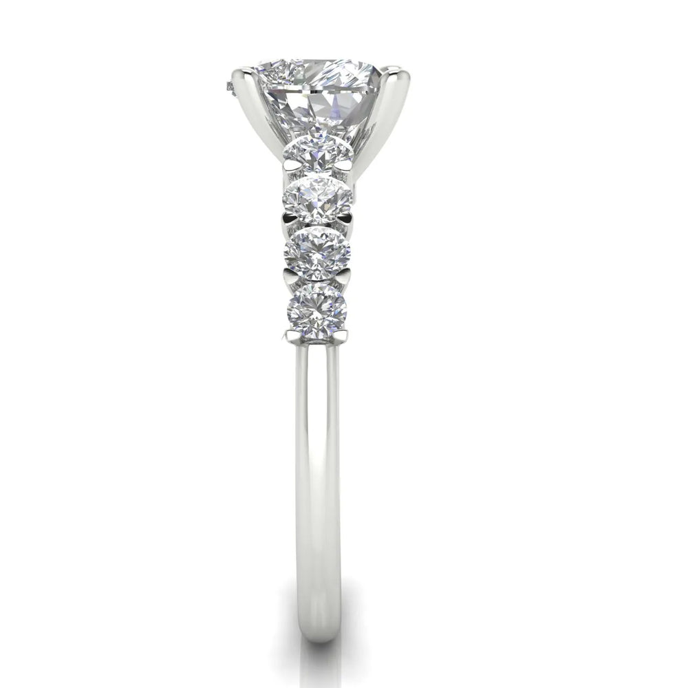 Elegant Solitaire Ring with Graduated Accent Stones