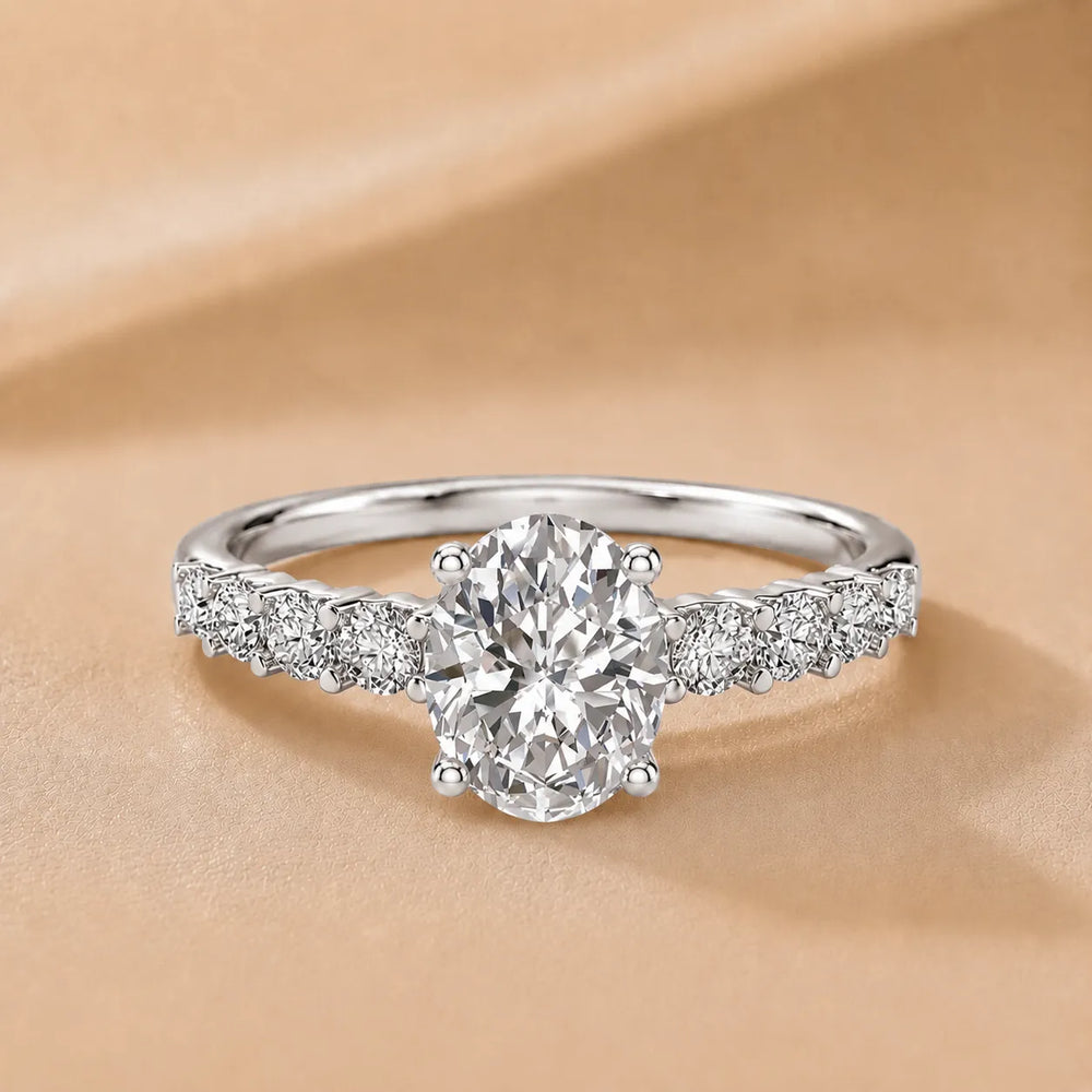 Elegant Solitaire Ring with Graduated Accent Stones