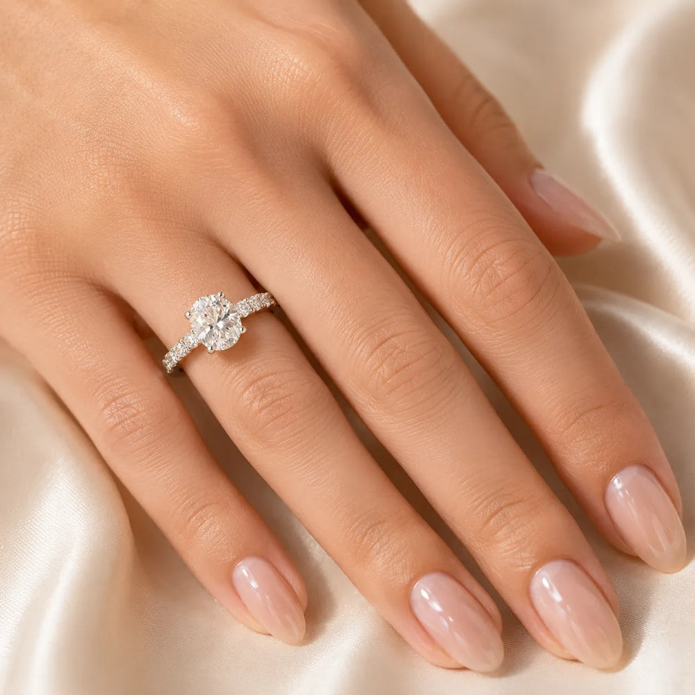 Elegant Solitaire Ring with Graduated Accent Stones