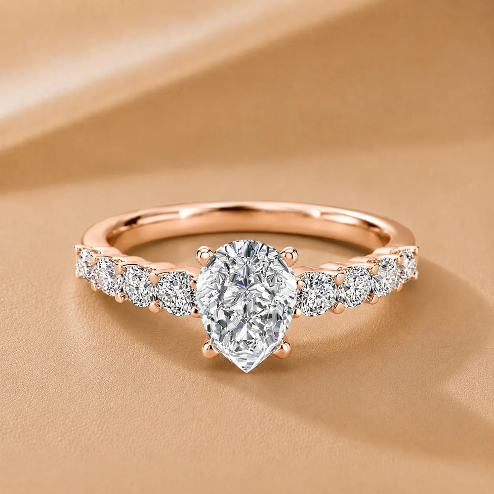 Elegant Solitaire Ring with Graduated Accent Stones