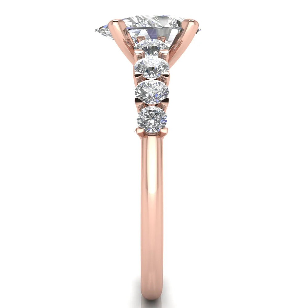 Elegant Solitaire Ring with Graduated Accent Stones