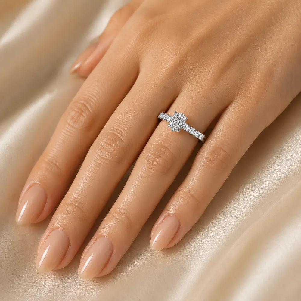 Elegant Solitaire Ring with Graduated Accent Stones