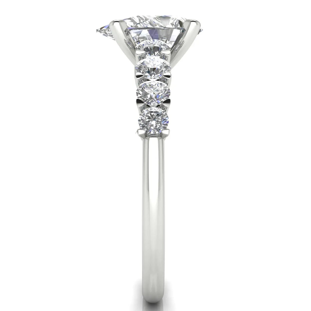 Elegant Solitaire Ring with Graduated Accent Stones