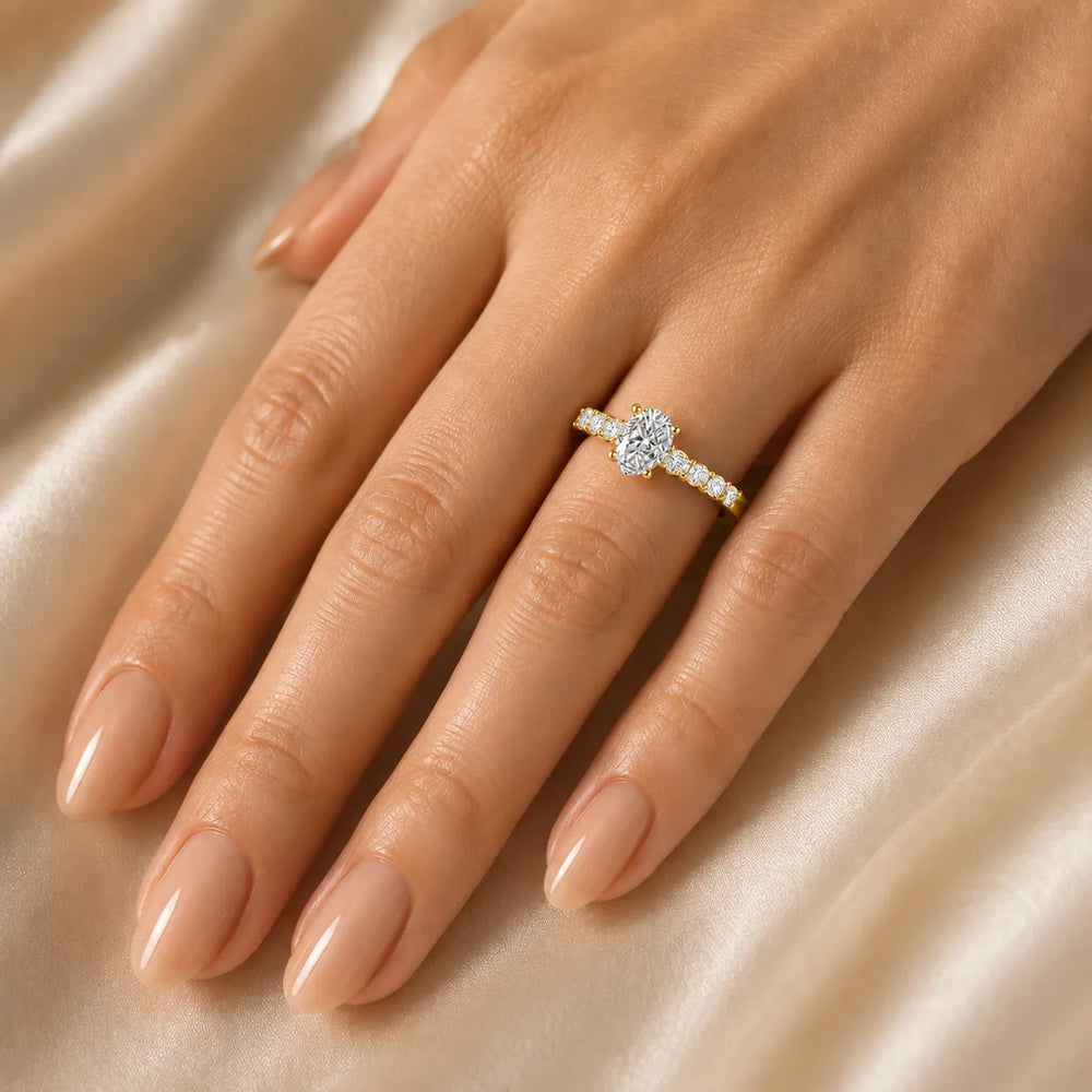 Elegant Solitaire Ring with Graduated Accent Stones