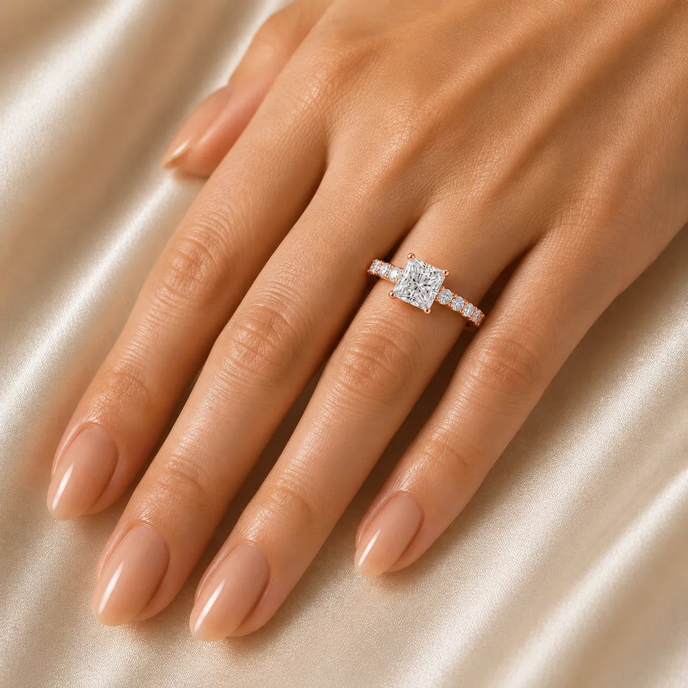 Elegant Solitaire Ring with Graduated Accent Stones