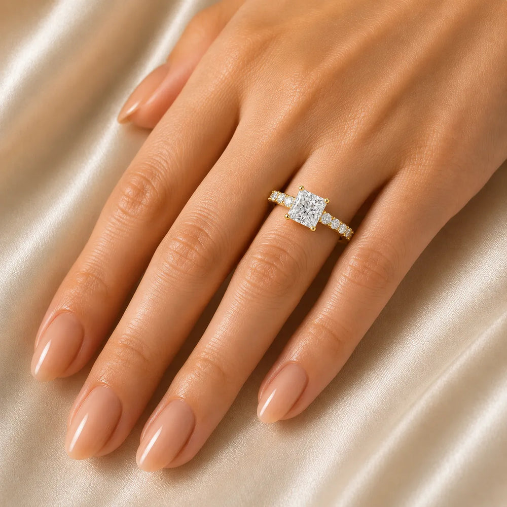 Elegant Solitaire Ring with Graduated Accent Stones