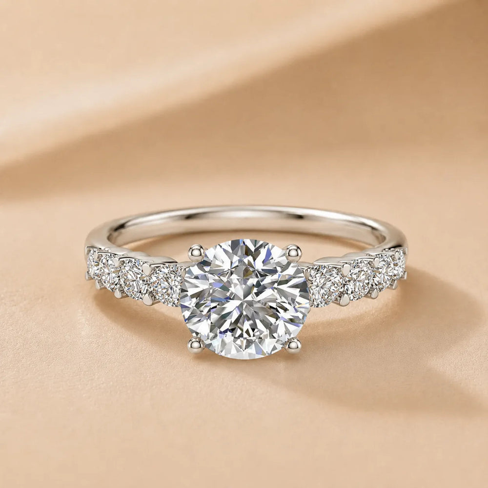 Elegant Solitaire Ring with Graduated Accent Stones – Round (925 Sterling Silver)