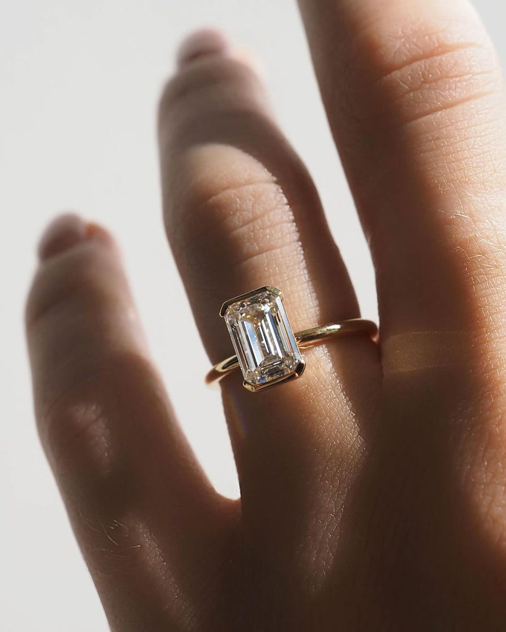 Bezel Set Emerald Cut Labgrown Engagement Ring