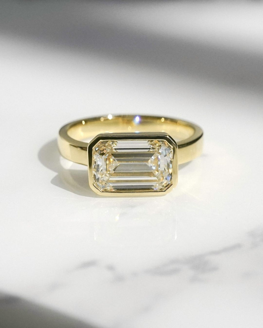 Bezel Set Emerald Cut Labgrown Engagement Ring