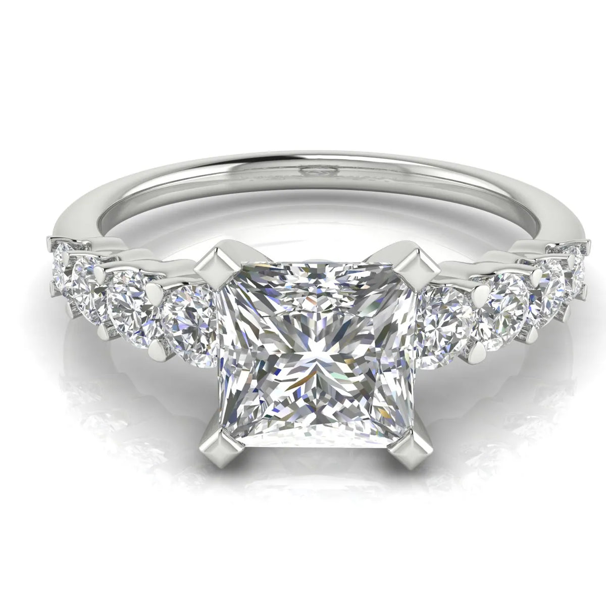 Elegant Solitaire Ring with Graduated Accent Stones