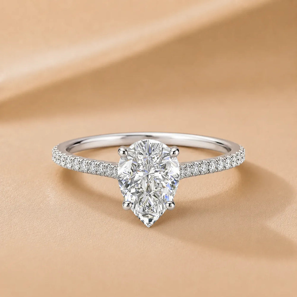 Elegant Pavé Solitaire Engagement Ring – Pear (925 Sterling Silver)