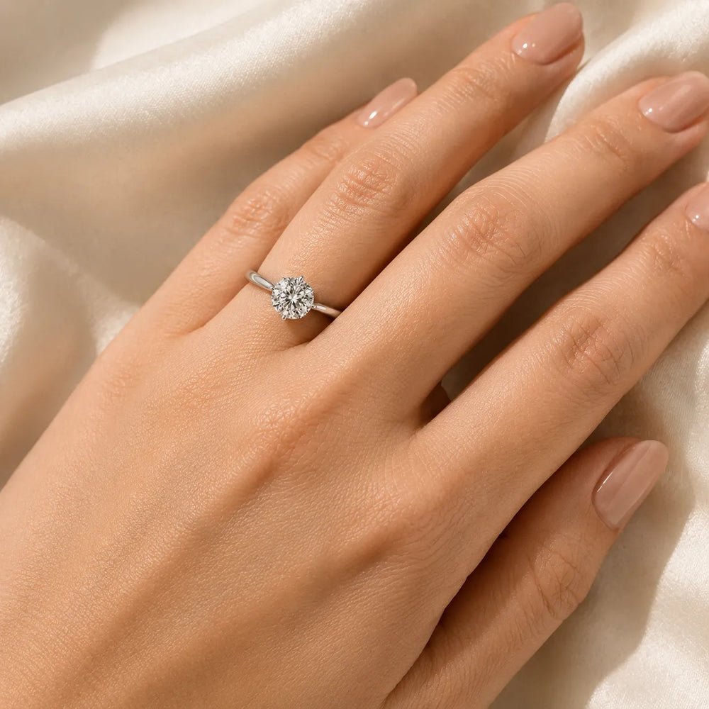 Classic Solitaire Engagement Ring with Refined Setting