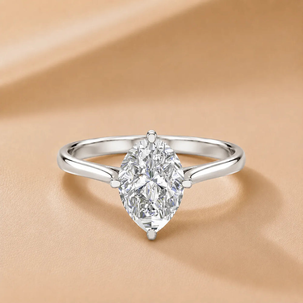 Classic Solitaire Engagement Ring with Refined Setting