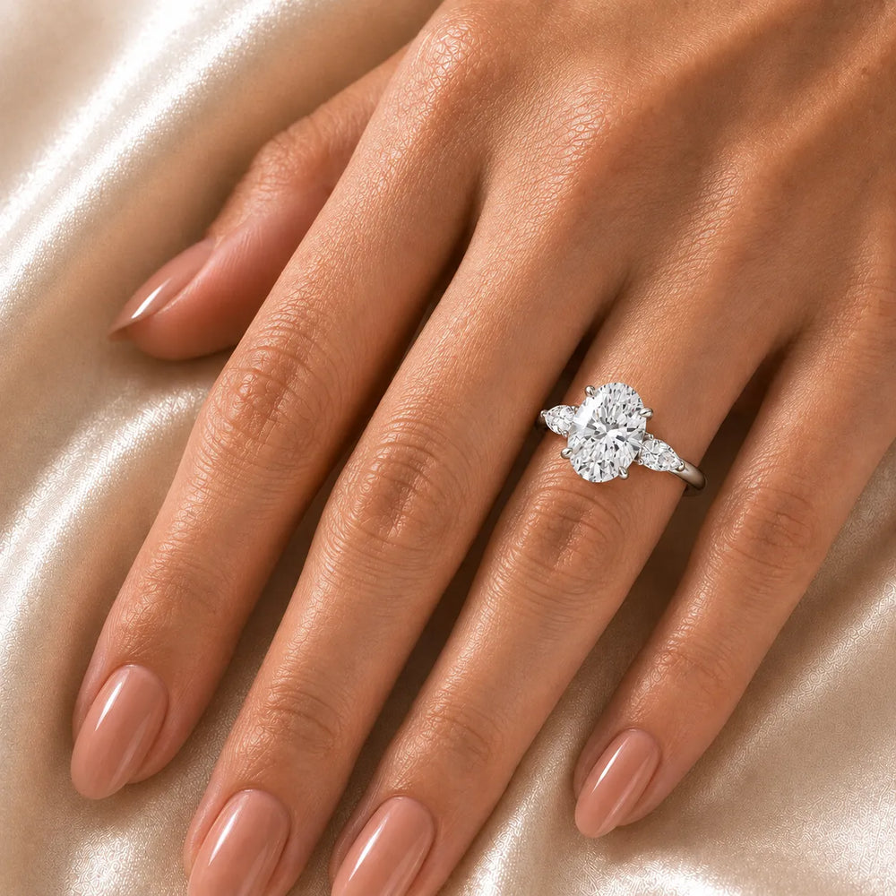 Designer Asscher Diamond Ring with Pear Side Stones