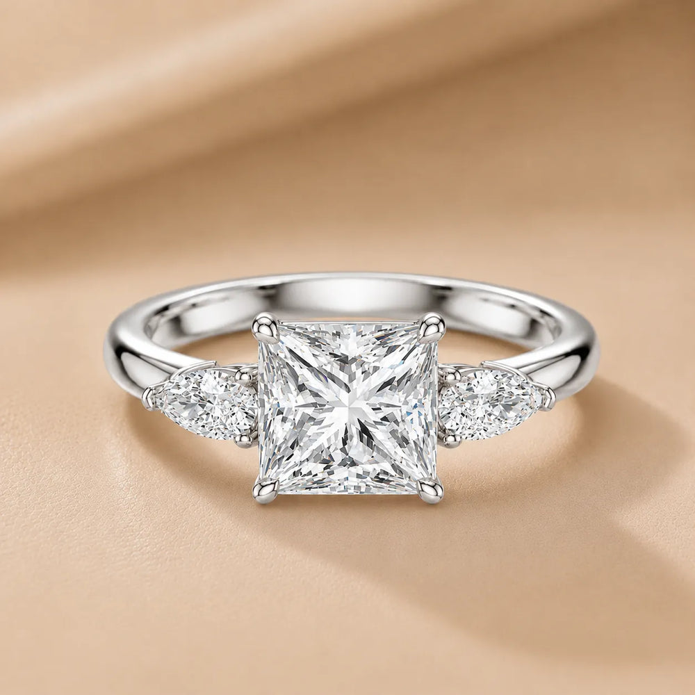 Designer Asscher Diamond Ring with Pear Side Stones
