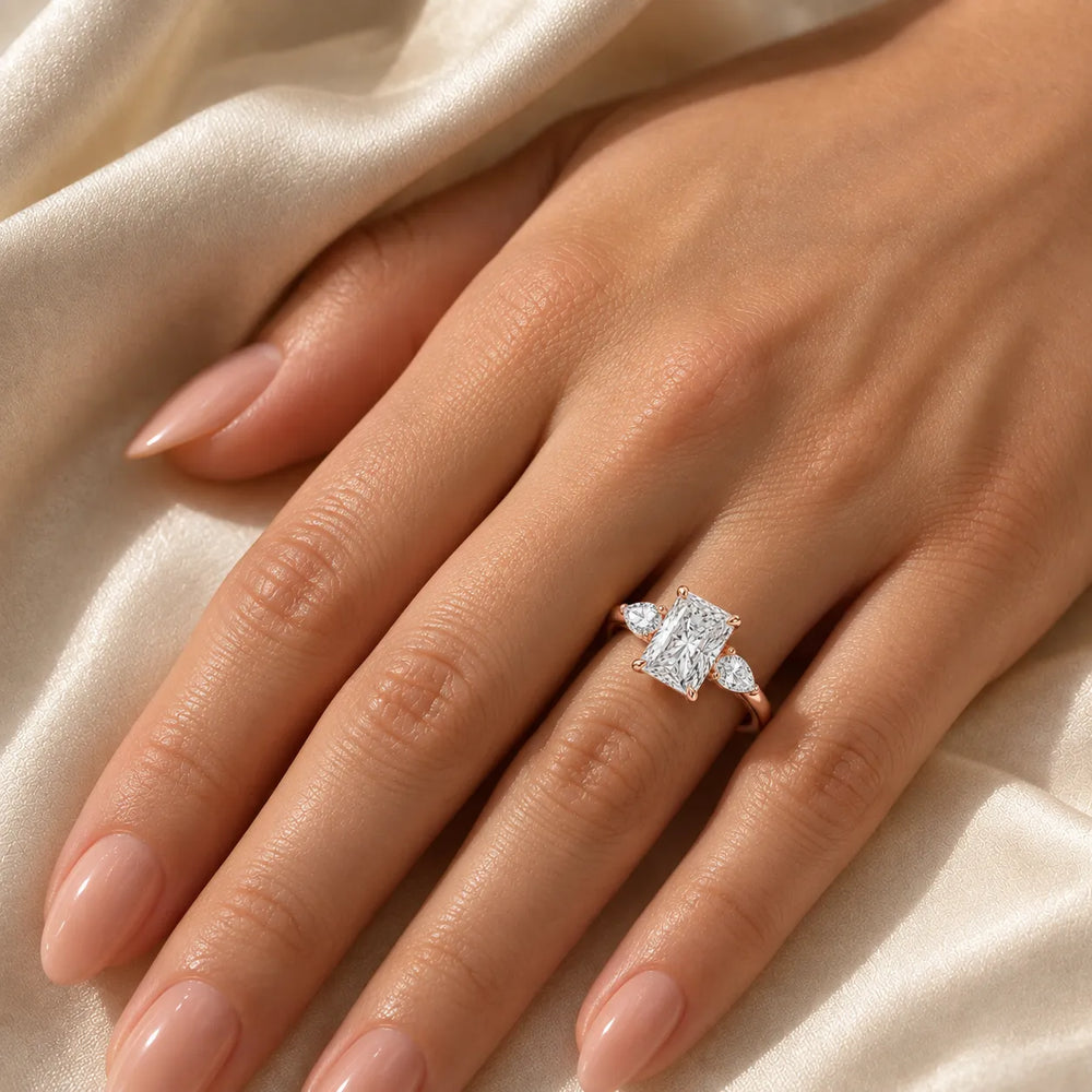 Designer Asscher Diamond Ring with Pear Side Stones
