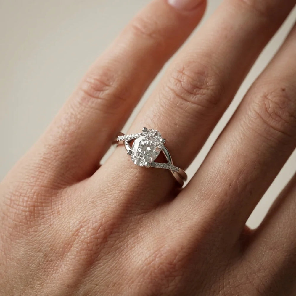 Veronica Twist Side Stone Oval Diamond Engagement Ring