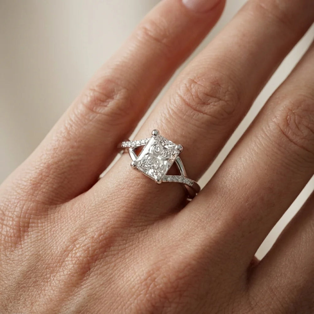Veronica Twist Side Stone Oval Diamond Engagement Ring