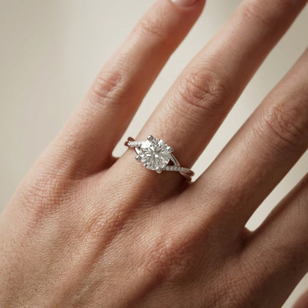 Veronica Twist Side Stone Oval Diamond Engagement Ring