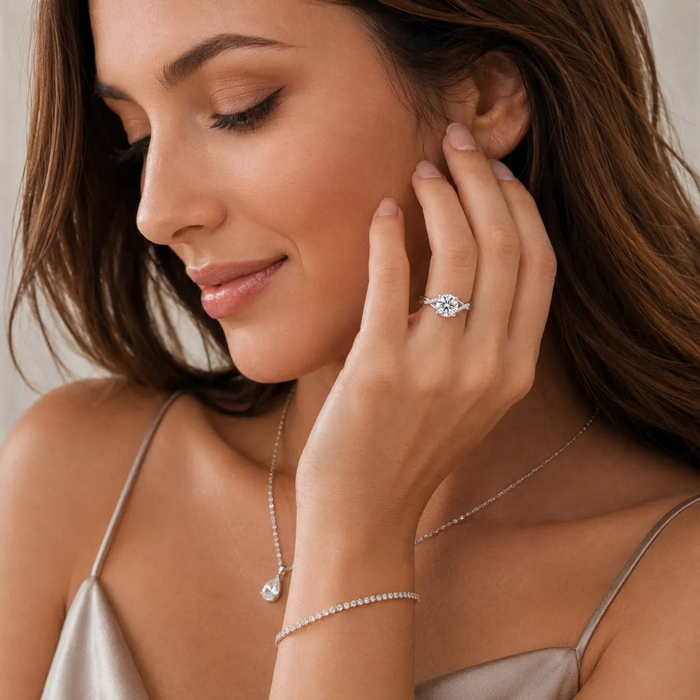 Veronica Twist Side Stone Oval Diamond Engagement Ring