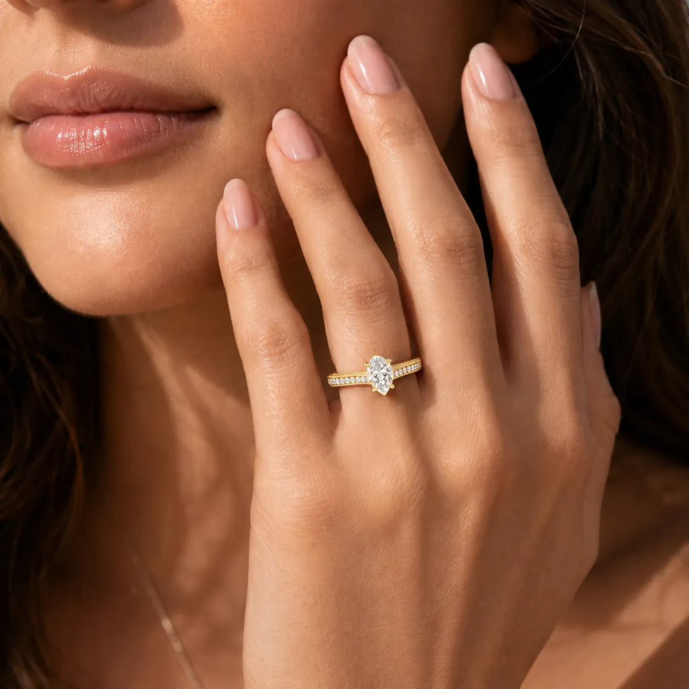 Vintage-Inspired Solitaire Ring with Accent Stones