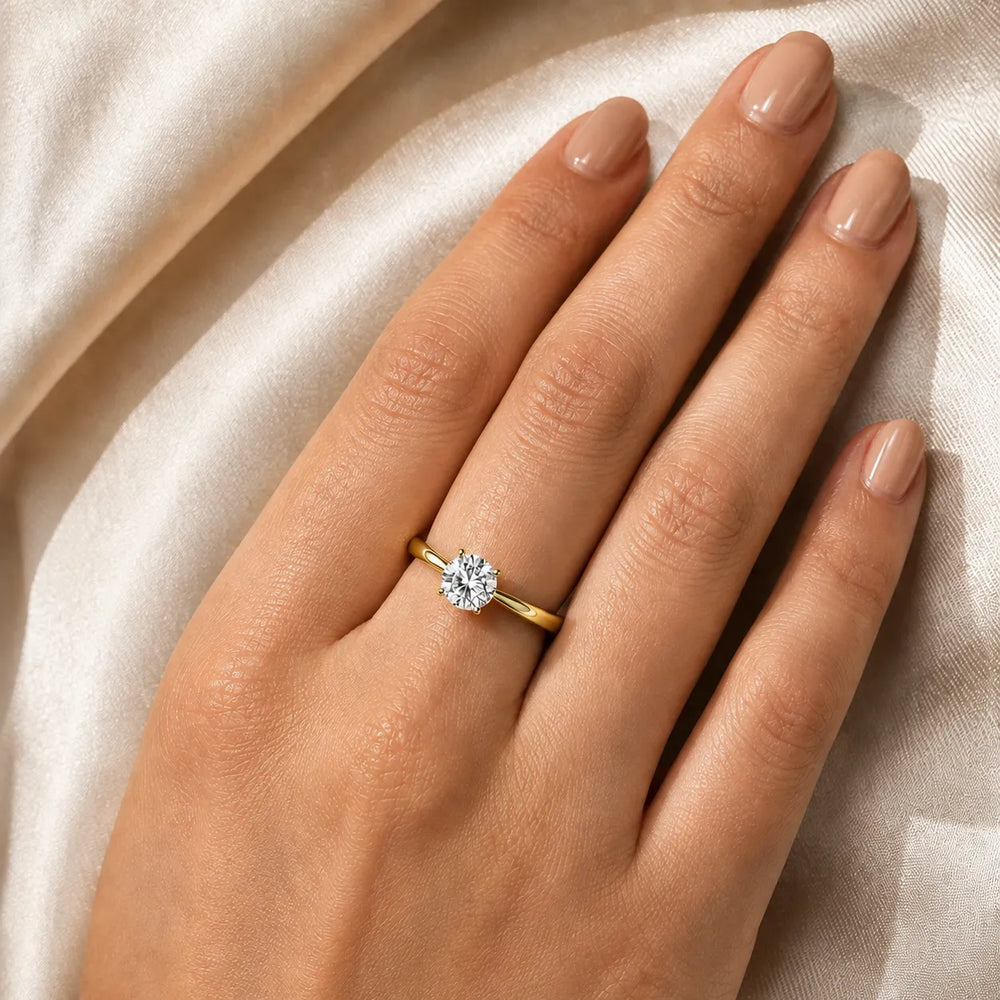Elegant Solitaire Ring with Tapered