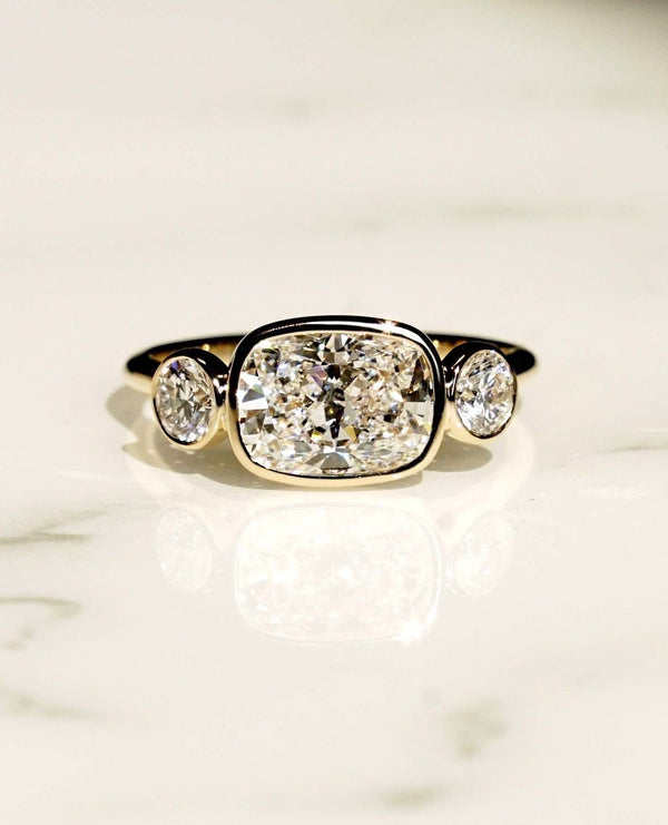 Bezel Set Three Stone Cushion Cut Labgrown Engagement Ring
