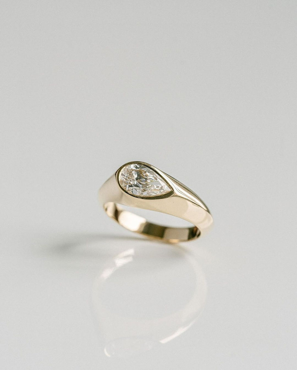 Bezel Set Elongated Pear Cut Labgrown Engagement Ring