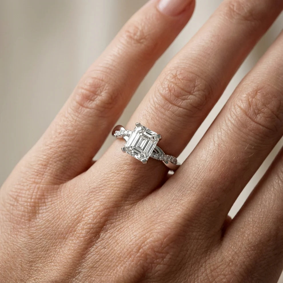 Twisted Side Stone Round Diamond Engagement Ring