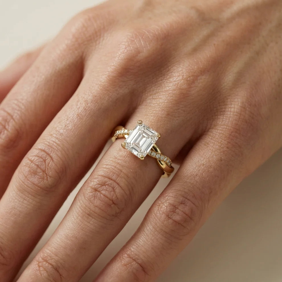 Twisted Side Stone Round Diamond Engagement Ring