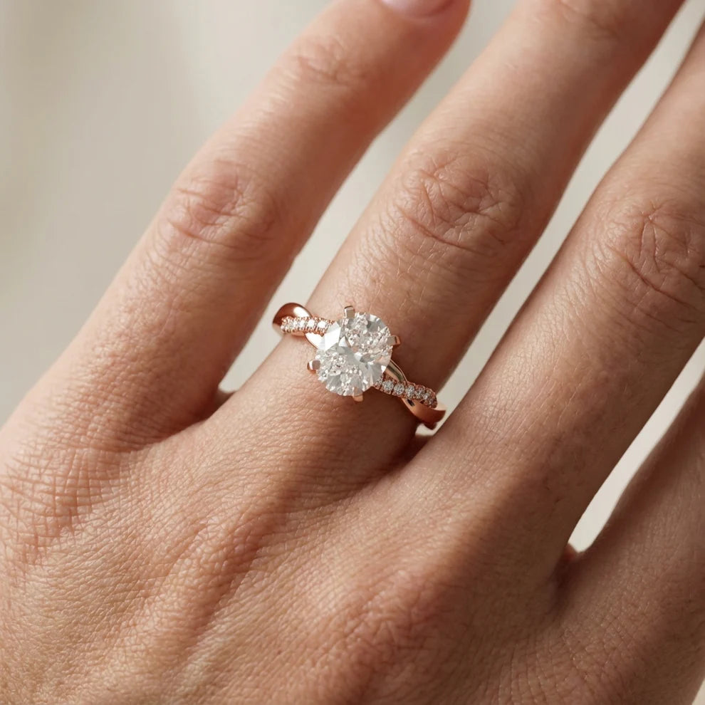 Twisted Side Stone Round Diamond Engagement Ring