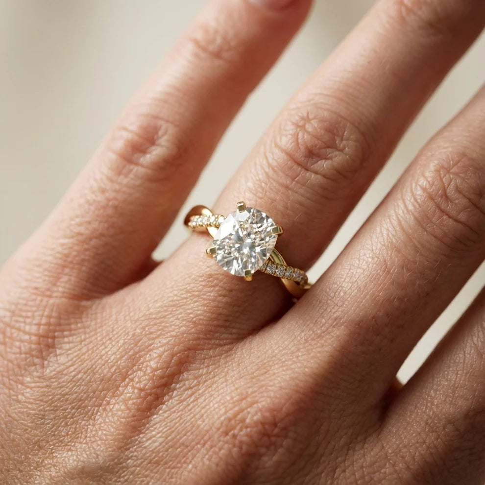 Twisted Side Stone Round Diamond Engagement Ring