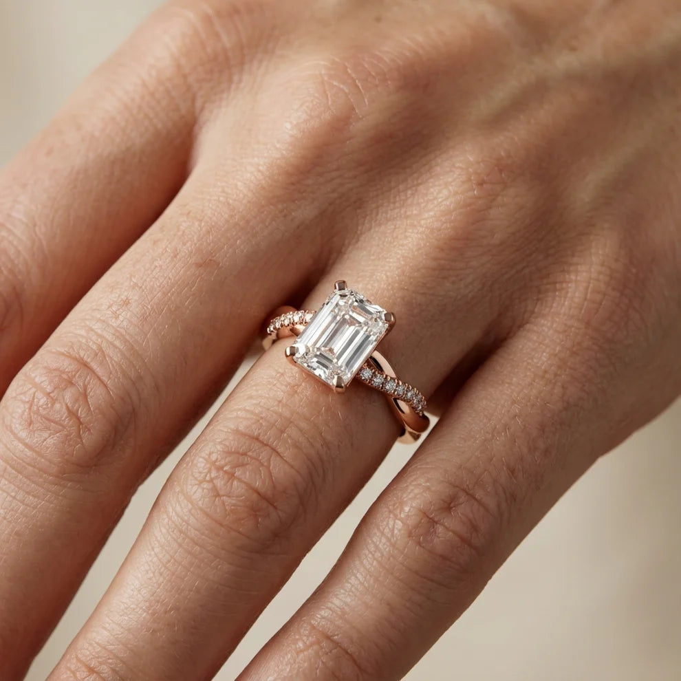 Twisted Side Stone Round Diamond Engagement Ring