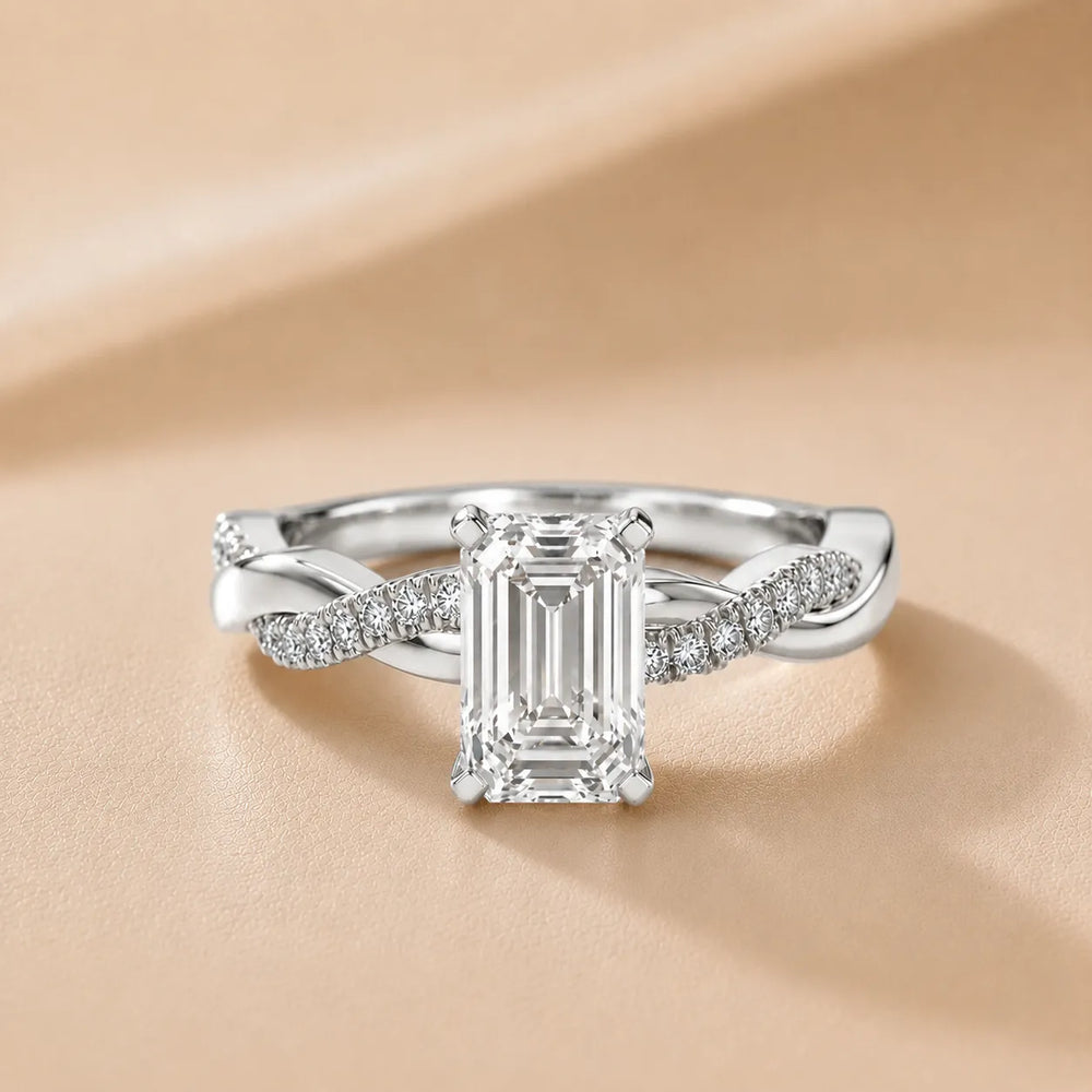 Twisted Side Stone Round Diamond Engagement Ring