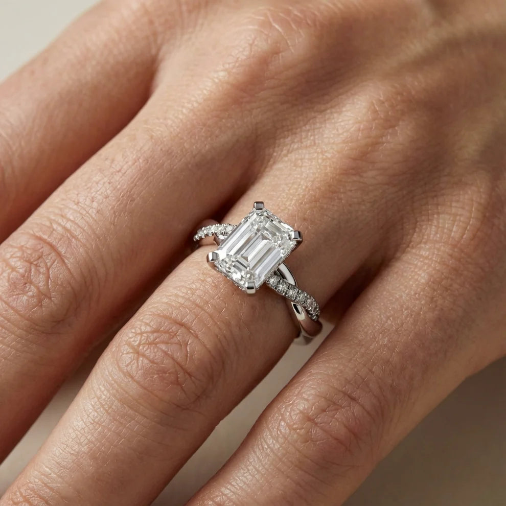 Twisted Side Stone Round Diamond Engagement Ring