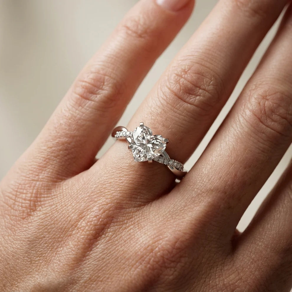 Twisted Side Stone Round Diamond Engagement Ring