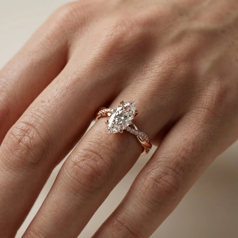 Twisted Side Stone Round Diamond Engagement Ring