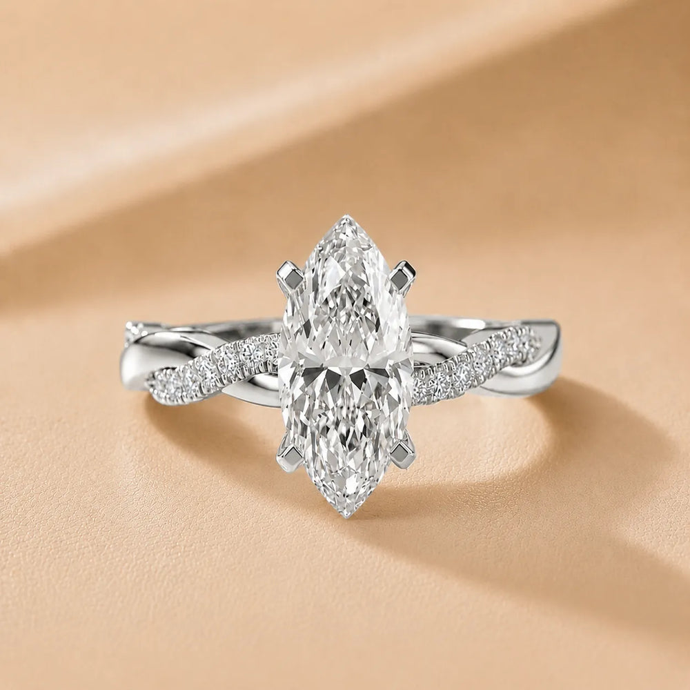 Twisted Side Stone Round Diamond Engagement Ring