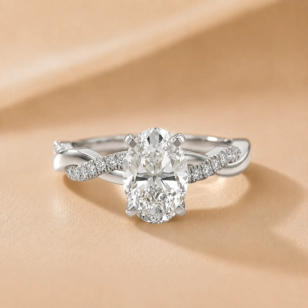Twisted Side Stone Round Diamond Engagement Ring