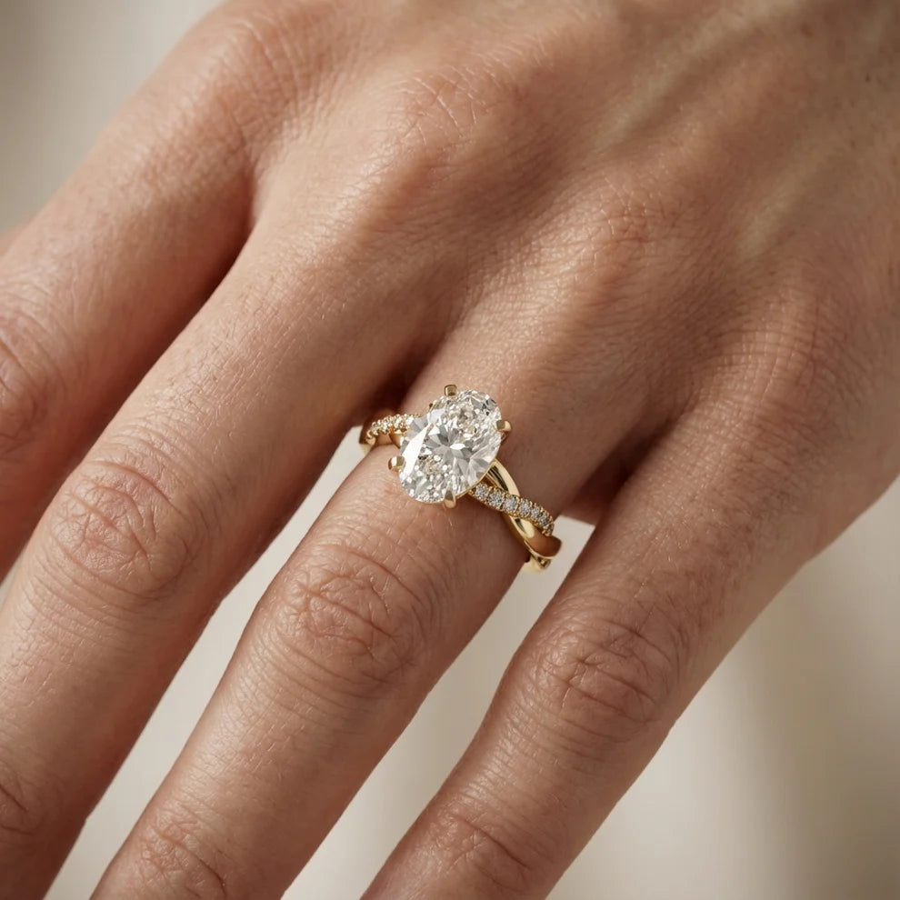 Twisted Side Stone Round Diamond Engagement Ring